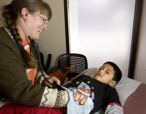 Paul Fraughton  |  The Salt Lake Tribune
Dr. Ellie Brownstein examines 6-year-old Ryan Caballero, who has asthma, at the Greenwood Health Center in Midvale Tuesday, November 13, 2012