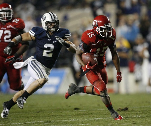 Trent Nelson  |  The Salt Lake Tribune
Utah's John White runs for a touchdown against BYU during the 2011 rivalry game in Provo.