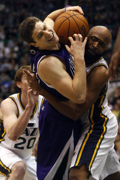 Chris Detrick  |  The Salt Lake Tribune
Sacramento Kings point guard Jimmer Fredette (7) and Utah Jazz point guard Jamaal Tinsley (6) go for the ball during the fourth quarter of the game at EnergySolutions Arena Friday November 23, 2012.  The Jazz won the game 104-102.