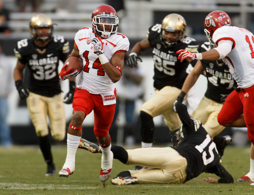 Trent Nelson  |  The Salt Lake Tribune
Utah Utes wide receiver Reggie Dunn (14) returns a kick for a touchdown in the fourth quarter as the Colorado Buffaloes host the University of Utah Utes, college football Friday November 23, 2012 in Boulder.