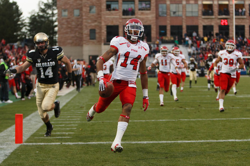Trent Nelson  |  The Salt Lake Tribune
Utah Utes wide receiver Reggie Dunn (14) returns a kick for a touchdown in the fourth quarter as the Colorado Buffaloes host the University of Utah Utes, college football Friday November 23, 2012 in Boulder.