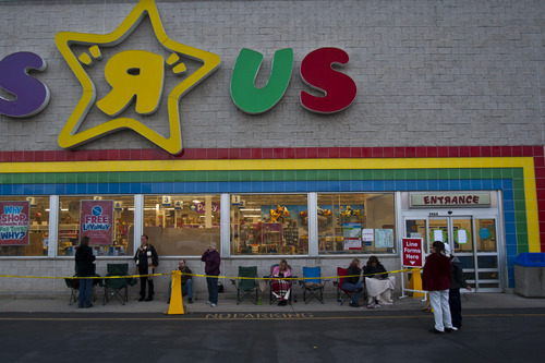 Chris Detrick  |  The Salt Lake Tribune
Shoppers wait in line for the 8pm opening of Toys"R"Us in Murray Thursday November 22, 2012.