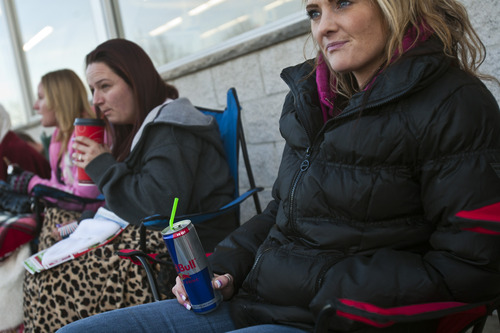 Chris Detrick  |  The Salt Lake Tribune
Michelle Sessions, of Salt Lake City, waits in line for the 8pm opening of Toys"R"Us in Murray Thursday November 22, 2012.