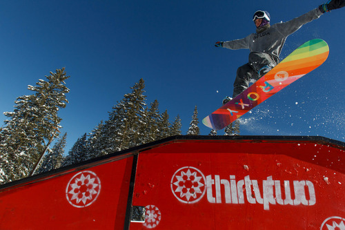 Trent Nelson  |  The Salt Lake Tribune
A snowboarder jumps off a rail on opening day at Brighton Ski Resort, Tuesday, Nov. 13, 2012 .