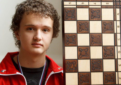 Trent Nelson  |  The Salt Lake Tribune
Kayden Troff, who took first place in the world among 13- to 14-year-olds in the World Youth Chess Tournament in Slovenia, shows the chess board he brought back from Slovenia on Wednesday November 21, 2012 in West Jordan.