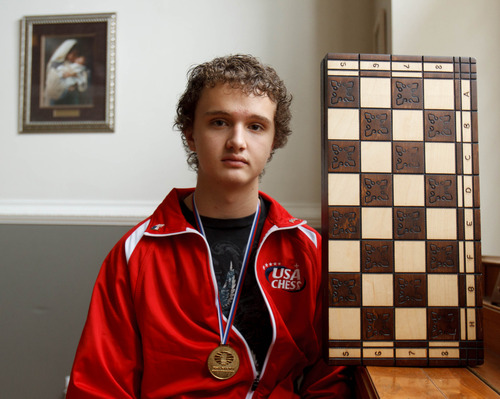 Trent Nelson  |  The Salt Lake Tribune
Kayden Troff, who took first place in the world among 13- to 14-year-olds in the World Youth Chess Tournament in Slovenia, shows the chess board he brought back from Slovenia on Wednesday November 21, 2012 in West Jordan.