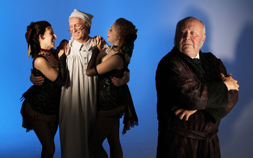 Francisco Kjolseth  |  The Salt Lake Tribune
Nikol Wolf, left, and Jessica Azenberg have fun with a friendlier transformed Scrooge played by Jamie Jackson for Pioneer Theatre Company while a more hardened Scrooge played by Richard Wilkins for Hale Centre Theatre looks back in dissaproval for their respective productions of "A Christmas Carol."