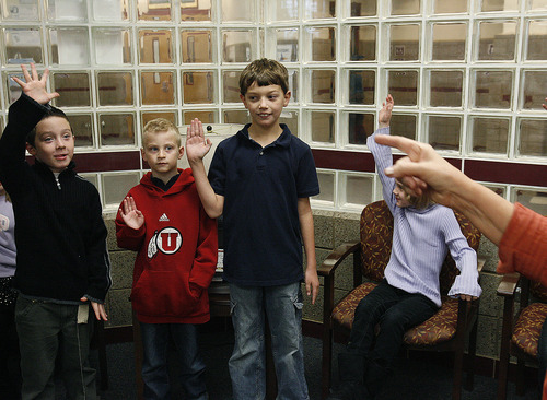 Scott Sommerdorf  |  The Salt Lake Tribune             
 Principal Karen Thomson asks which students are using the "7 Habits of Highly Successful People" in their daily life as she awards this month's "The Leader in Me" winners at Falcon Ridge Elementary, Monday, November 21, 2011. They are from left to right: Dylan Chesworth, Weston Schmelter, Bryce Doerr, Shaelyn Muncey. This school year is its second to implement "The Leader in Me" program - it's Franklin Covey's educational program in which kids are taught daily how to use the "7 habits of highly successful people."