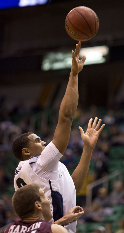 Lennie Mahler  |  The Salt Lake Tribune
BYU's Brandon Davies puts up a shot in the Cougars' 85-60 win over the Montana Grizzlies at EnergySolutions Arena, Wednesday, Nov. 28, 2012.