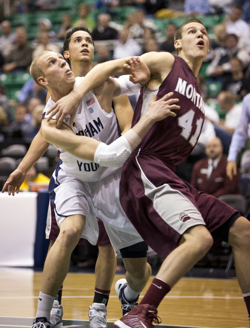 Lennie Mahler  |  The Salt Lake Tribune
BYU Nate Austin battles for a rebound as he is boxed out by Montana's Andy Martin during a game against the Montana Grizzlies at EnergySolutions Arena, Wednesday, Nov. 28, 2012.