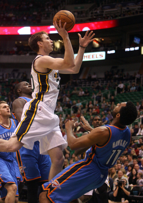 Steve Griffin | The Salt Lake Tribune


Utah's Gordon Hayward crashes into the Thunder's Lazar Hayward as he drives the lane against the Thunder in a preseason game at EnergySolutions Arena in Salt Lake City on Friday, Oct. 12, 2012.