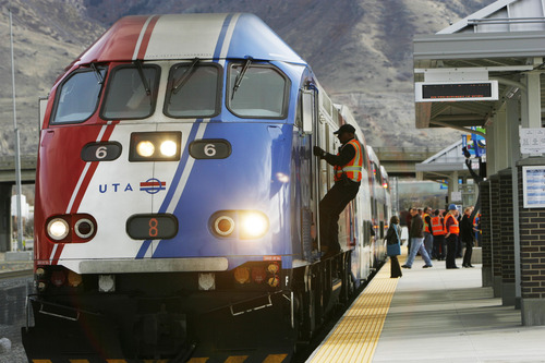 Francisco Kjolseth  |  The Salt Lake Tribune
Train operator Ananda Alles climbs aboard the FrontRunner engine as he gets ready to transport the media from the new Provo station back to Salt Lake City on Friday, November 30, 2012, as UTA gets ready to open for regular service on Monday, December 10, 2012. The public is also welcome to try out the line as part of their "Food for your fare" on Saturday, December 8, 2012, from 10 a.m to 10 p.m by providing a non-perishable food item to be donated as "fare" to benefit the Utah Food Bank and the Community Action Services.