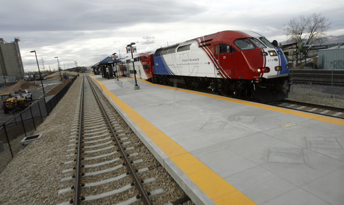 Francisco Kjolseth  |  The Salt Lake Tribune
FrontRunner trains pass one another along the North South corridor as the media is invited to ride the new FrontRunner line from Salt Lake City to Provo on Friday, November 30, 2012, as UTA gets ready to open for regular service on Monday, December 10, 2012. The public is also welcome to try out the line as part of their "Food for your fare" on Saturday, December 8, 2012, from 10 a.m to 10 p.m by providing a non-perishable food item to be donated as "fare" to benefit the Utah Food Bank and the Community Action Services.