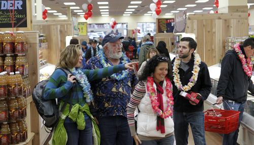 Al Hartmann  |  The Salt Lake Tribune
Customers shop and get to know the new Trader Joe's during the opening of the new store at 634 East 400 South in Salt Lake City Friday November 30 at 8 a.m.