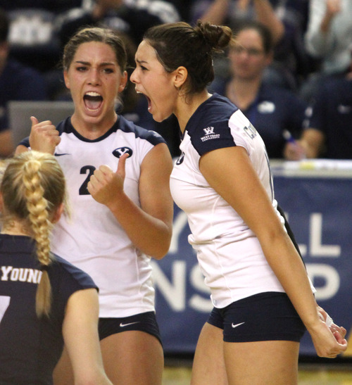 Rick Egan  | The Salt Lake Tribune 

 Heather Hannemann (2) and Ciara Parker (14) and Kimberly Dahl (13) react after BYU scored a big point in game 3, as BYU faced Oklahoma in women's NCAA volleyball action at the Smith Fieldhouse in Provo, Saturday, December 1, 2012.