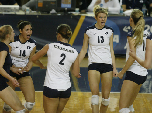 Rick Egan  | The Salt Lake Tribune 

Tia Withers (17) Ciara Parker (14) Heather Hannemann (2) and Kimberly Dahl (13) and Nicole Warner (15) celebrate after BYU scores in game 3, as BYU faced Oklahoma in women's NCAA volleyball action at the Smith Fieldhouse in Provo, Saturday, December 1, 2012.