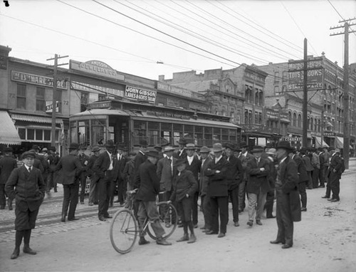 Street car workers strike on Main Street in Salt Lake City. The strike started on Sunday April 28, 1907, and ended the following day, B.H. Roberts helped mediate and Utah Light and Railway management and the strikers were able to come to an agreement. A man named Joseph Jones was onboard the street car in this photo when he was assaulted by a group of strikers. A Salt Lake Tribune article reported the incident like this: "The crowd started to devote its attention to Jones. He was treated to a shower of eggs and drew his gun. He announced he would shoot the next man who struck him. A man grabbed his revolver from behind and took it from him. Jones was knocked down and kicked... At this point Policeman Lyon appeared and took charge of Jones. He was escorted to the police station, where he remained until the crowd found a new diversion in badgering a street car conductor and forgot all about him." Photo courtesy Utah State Historical Society