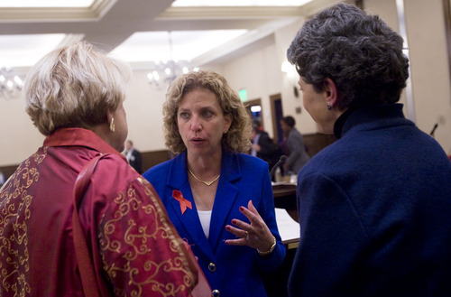 Kim Raff  |  The Salt Lake Tribune
DNC Chairwoman Debbie Wasserman Schultz, center, talks with Utah House member Patrice Arent, D-Millcreek, right, and a DNC Executive Committee member after the DNC Executive Committee meeting at the Montage at Deer Valley in Park City on December 1, 2012.