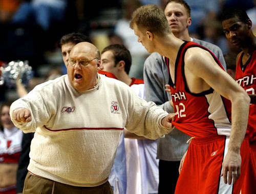Utah head coach Rick Majerus instructs center Cameron Koford (42) before sending him into the game against Kentucky in the first half at the NCAA Midwest Regional basketball tournament on Sunday, March 23, 2003 in Nashville, Tenn. (AP Photo/Al Behrman)