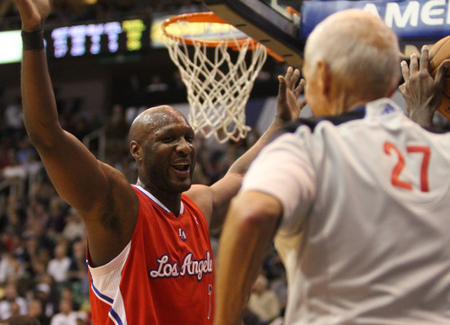 Rick Egan  | The Salt Lake Tribune 

Los Angeles Clippers power forward Lamar Odom (7) complains to referee Dick Bavetta (27) in NBA action. The Los Angeles Clippers beat the Jazz 105-104, in Salt Lake City, Monday, December 3, 2012.