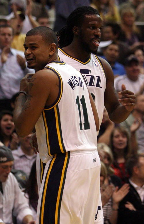 Kim Raff  |  The Salt Lake Tribune
(back) Utah Jazz small forward DeMarre Carroll (3) and Utah Jazz point guard Earl Watson (11) celebrate Carroll turning over the ball and drawing a foul during a game against Orlando at EnergySolutions Arena in Salt Lake City on December 5, 2012. Jazz went on to win 87-81.
