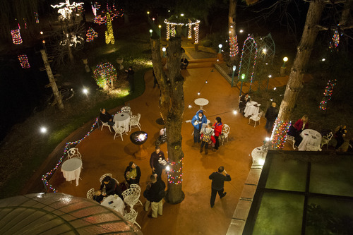 Chris Detrick  |  The Salt Lake Tribune
Guests walk around La Caille during their "Light's On" party, which featured hot cocoa and beignets on Nov. 20, 2012.