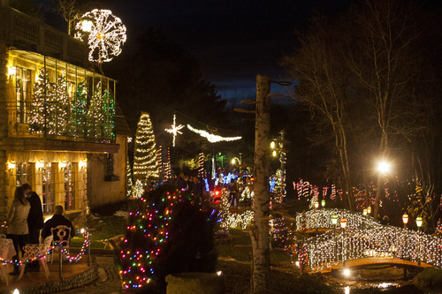 Chris Detrick  |  The Salt Lake Tribune
Guests walk around La Caille during their "Light's On" party.