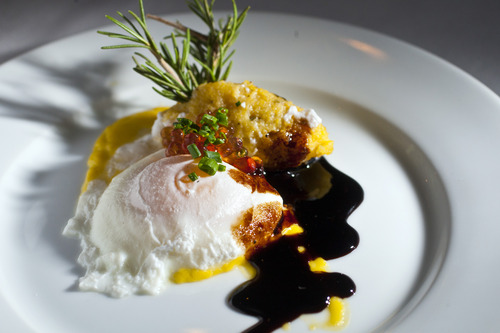Chris Detrick  |  The Salt Lake Tribune
La Caille's poached egg with corn cake, polenta quenelle, balsamic reduction, shaved Oregon black truffle, sweet corn paste and chive pearls ($12).
