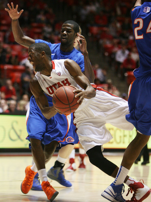 Steve Griffin | The Salt Lake Tribune


Utah's Jarred DuBois leans past Boise State's Mikey Thompson as he tries to score against Boise State at the Huntsman Center  in Salt Lake City on Wednesday, Dec. 5, 2012.