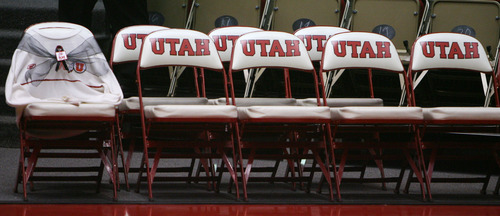 Steve Griffin | The Salt Lake Tribune


A white University of Utah sweater, a Rick Majerus trademark, is draped over a chair with a black ribbon, on the University of Utah's bench in honor of the former head coach who passed away. He was remembered during a short ceremony before the start of the Utah game against Boise State  in Salt Lake City on Wednesday, Dec. 5, 2012.