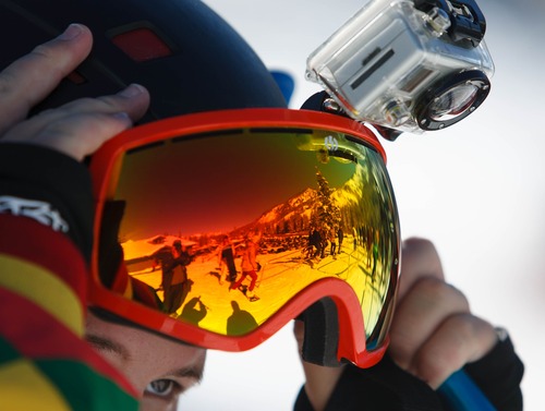 Trent Nelson  |  The Salt Lake Tribune
A snowboarder adjusts his goggles on opening day at Brighton Ski Resort, Tuesday November 13, 2012 in Brighton.