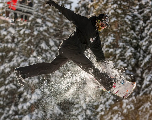 Trent Nelson  |  The Salt Lake Tribune
Jeff McGrath jumps off a rail on opening day at Brighton Ski Resort on Nov. 13, 2012.