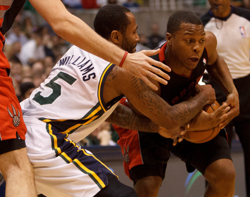 Trent Nelson  |  The Salt Lake Tribune
Toronto Raptors point guard Kyle Lowry (3) steals the ball from Utah Jazz point guard Mo Williams (5) as the Utah Jazz face the Toronto Raptors Friday December 7, 2012.