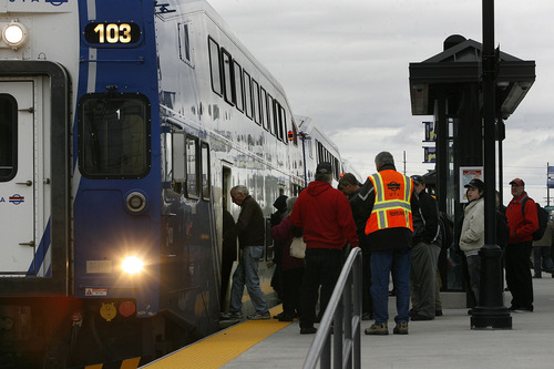Scott Sommerdorf  |  The Salt Lake Tribune              
Riders board the FrontRunner train in Salt Lake City for the free ride to Provo, Saturday, December 8, 2012. The public was invited to ride the new FrontRunner line linking Provo and Salt Lake City starting at 10 a.m.