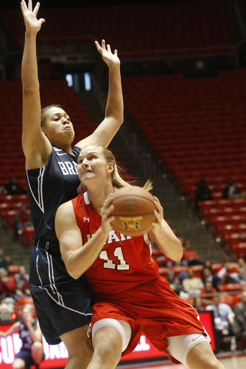 Chris Detrick  |  The Salt Lake Tribune
Brigham Young Cougars forward Morgan Bailey (41) guards Utah Utes forward Taryn Wicijowski (11) during the first half of the game at the Huntsman Center Saturday December 8, 2012. BYU is winning the game 28-21 at halftime.