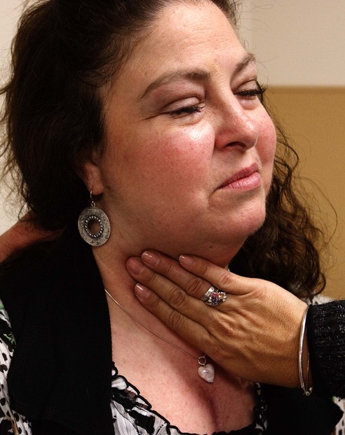 Leah Hogsten  |  The Salt Lake Tribune
Mirta López feels her daughter's heart beating as she checks Allyson Gamble's pulse. Gabriela Caballero was killed one year ago in an auto-pedestrian accident and her heart was donated to Gamble, a Salt Lake City woman and mother of one.