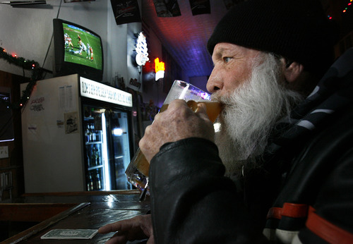 Scott Sommerdorf  |  The Salt Lake Tribune              
Gary Clark drinks some of his beer while watching NFL football Sunday, December 9, 2012 at Sofa's Bar in Garland, Utah. The bar began selling beer on Sunday and will continue to sell on Sundays through Super Bowl Sunday on Feb. 13.