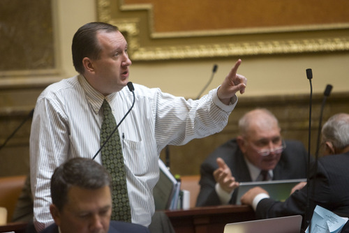 Al Hartmann  |  Tribune file photo
State Auditor-elect John Dougall says he will retain most of the employees in the office, although it is one of the few agencies where he has the power to hire and fire all staffers at will. In this file photo, the state Republican lawmaker from Highland, speaks on the House floor.