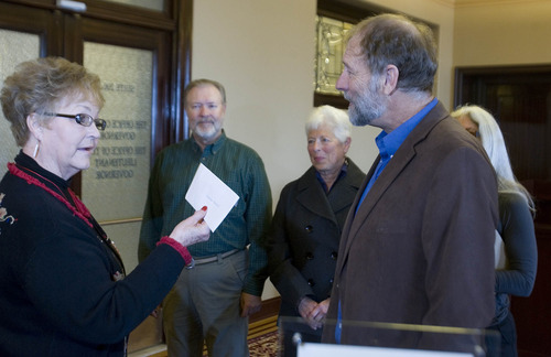 Paul Fraughton  |  The Salt Lake Tribune
Steve Erickson of The Great Basin Water Network, right, with Kirk Robinson, executive director of The Western Wildlife Conservancy, Linda Johnson of The Salt Lake League of Women Voters and Lynn de Freitas of The Friends of Great Salt Lake, hand a letter to Fran Fish of Gov. Gary Herbert's office urging him not to sign the proposed agreement with Nevada dealing with water in Utah's Snake Valley.
 Tuesday, December 11, 2012
