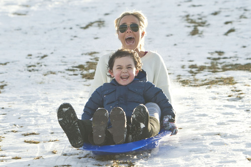 Chris Detrick  |  The Salt Lake Tribune
Maddi Jenson and Marcus Jenson, 5, sled at Sugar House Park Tuesday December 11, 2012.