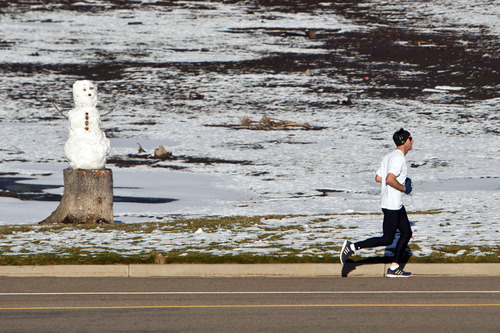 Chris Detrick  |  The Salt Lake Tribune
A runner runs around Sugar House Park Tuesday December 11, 2012.