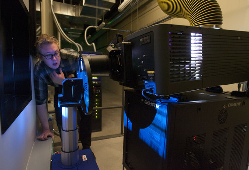 Steve Griffin | The Salt Lake Tribune


Matt Higgins works with a digital 3D projector at The Megaplex Theaters at the Valley Fair Mall in West Valley City on Dec. 10, 2012. The theatre will be showing The Hobbit in a new process that projects it at 48 frames per second as opposed to 24 frames per second for more clarity.