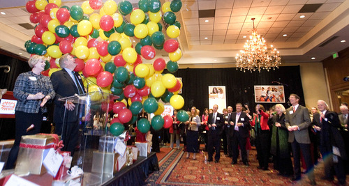 Paul Fraughton  |   The Salt Lake Tribune
Balloons drop from the ceiling Wednesday as President and CEO of United Way of Salt Lake, Deborah Bayle, and Kem Gardner, a co-chairman of the "Changing the Odds Program" announce to a group of supporters gathered at the Marriott City Center the results of the program, a total of $14,312,600.
 Wednesday, December 12, 2012