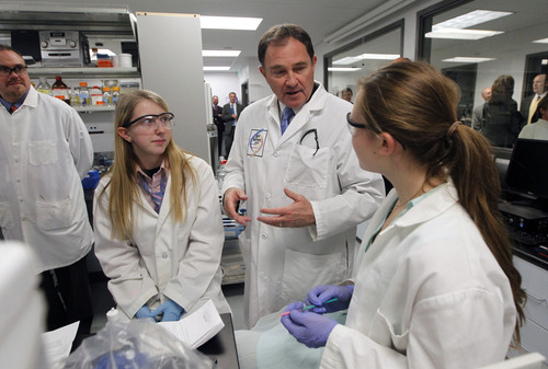 Al Hartmann  |  The Salt Lake Tribune
Gov. Gary Herbert takes a tour of Granite Technical Institute Wednesday to emphasize the focus in his state budget plan on science, technology, engineering and math education. He talks with Haley Hiskey, left, and Sydney Porter as they work in the biology lab working on a water test.