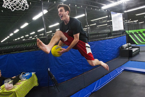 Chris Detrick  |  The Salt Lake Tribune
Andy Steggell, 19, of Orem, dunks the basketball at the Wairhouse Trampoline Park. The Wairhouse has 15,000 square feet of trampoline area including two full size dodge ball courts, four slam dunk basketball lanes, foam pit and an open jump court.