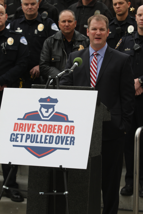 Rick Egan  |  The Salt Lake Tribune 
Intermountain Medical Center Medical Director David Barnes talks about the dangers of drinking and driving, Thursday, Dec. 13, 2012. The snowman display at The Gateway in Salt Lake City is part of the "Drive sober or get pulled over" campaign.