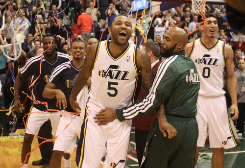 Rick Egan  | The Salt Lake Tribune 

Utah Jazz point guard Mo Williams (5) celebrates after hitting a 3-point shot at the buzzer to give the Jazz a 99-96 win over the San Antonio Spurs in NBA action, at the Energy Solutions Arena, Wednesday, December 12, 2012.