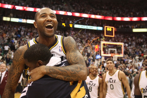 Rick Egan  | The Salt Lake Tribune 

Utah Jazz point guard Mo Williams (5) celebrates  with Utah Jazz power forward Marvin Williams (2), after hitting a 3-point shot at the buzzer to give the Jazz a 99-96 win over the San Antonio Spurs in NBA action, at the Energy Solutions Arena, Wednesday, December 12, 2012.