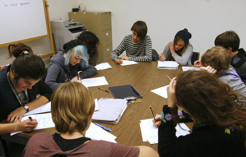 Rick Egan  | The Salt Lake Tribune 

Students take a timed writing test at City Academy, Thursday, December 13, 2012.   The State Charter School Board is taking a closer look at charter school enrollment numbers, so they can add those seats into the pool available for new schools.