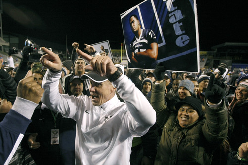 Chris Detrick  |  The Salt Lake Tribune
Utah State Aggies head coach Gary Andersen celebrates with the fans after winning the Famous Idaho Potato Bowl at Bronco Stadium Saturday December 15, 2012.  The Aggies beat the Rockets, 41-15.